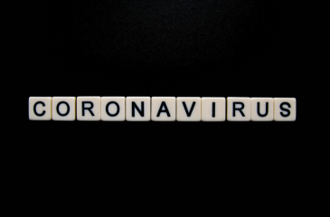 The word CORONAVIRUS spelled out in scrabble letters